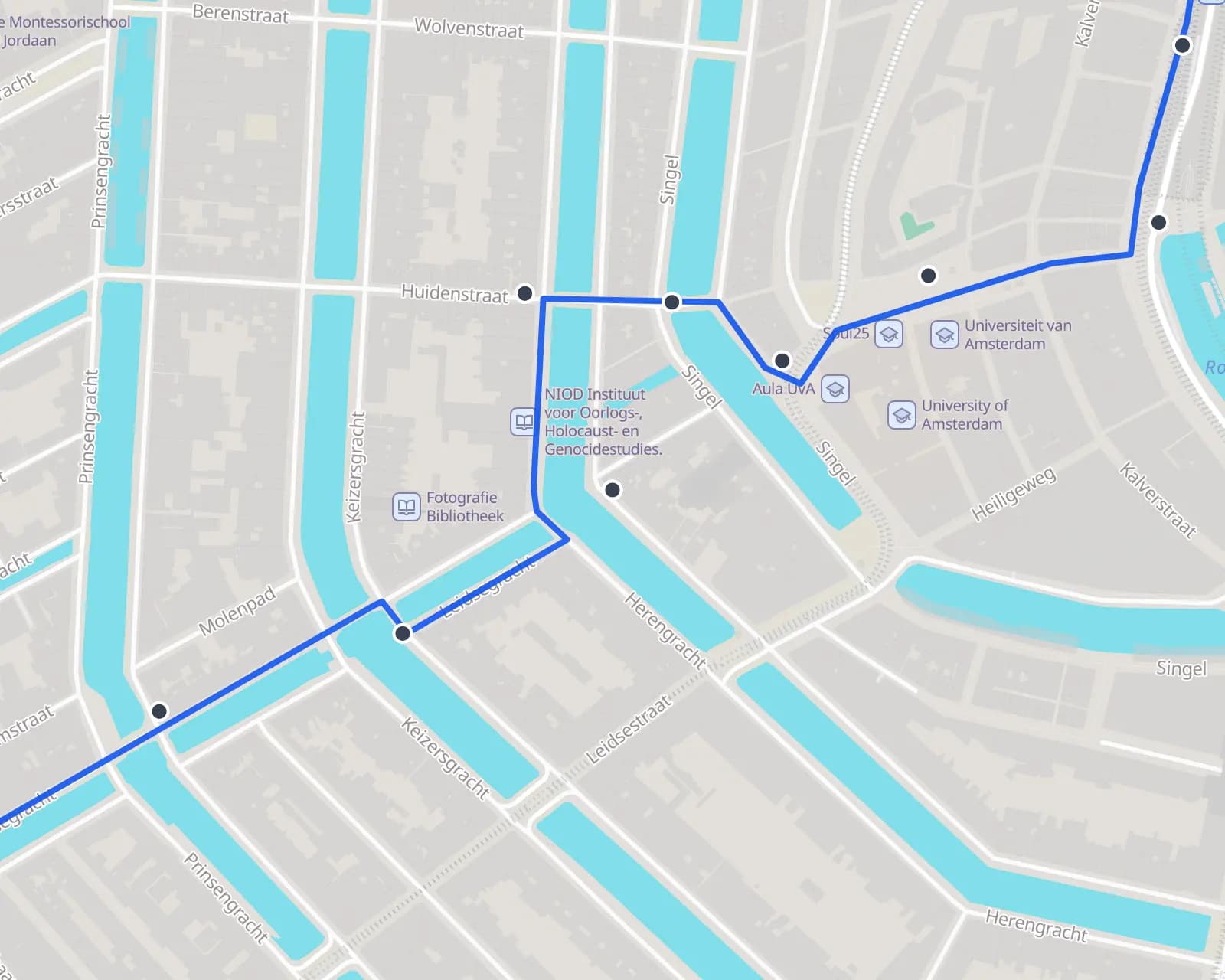Scattered GPS fixes beside Amsterdam streets with the matched route on them